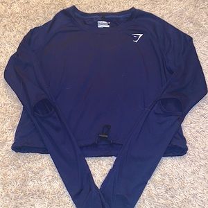 Dark blue gymshark top !! Open slits in elbows and drawstring waist size M